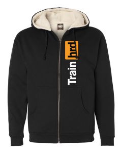 a black sherpa hoodie with the Train Hard decal on the left side of the zipper