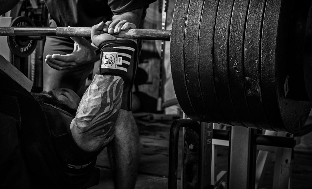 elitefts heavy wrist wraps being used for bench press