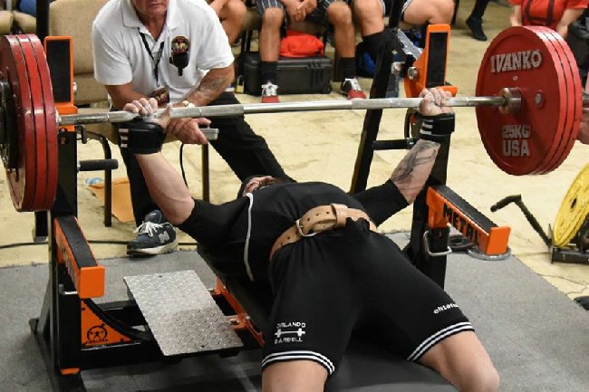 3/1- Shirted Benching with a catcher’s mitt for a hand.