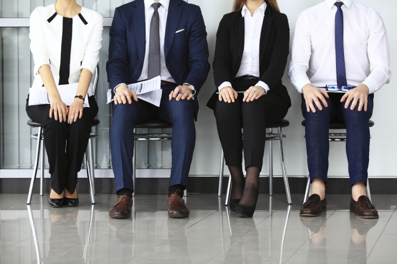 people waiting for job interview. Four candidates 