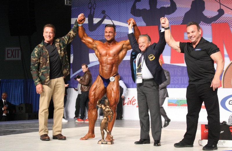 Men_s Bodybuilding Overall Winner Pau l Poloczek of Germany, Left to Right Gov. Arnold Schwarzenegger, Poloczek,Dr. Rafael Santonja, Rich Gaspari