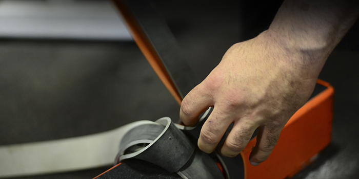 WATCH: Cambered Bar Band Setup with Tension at the Bottom