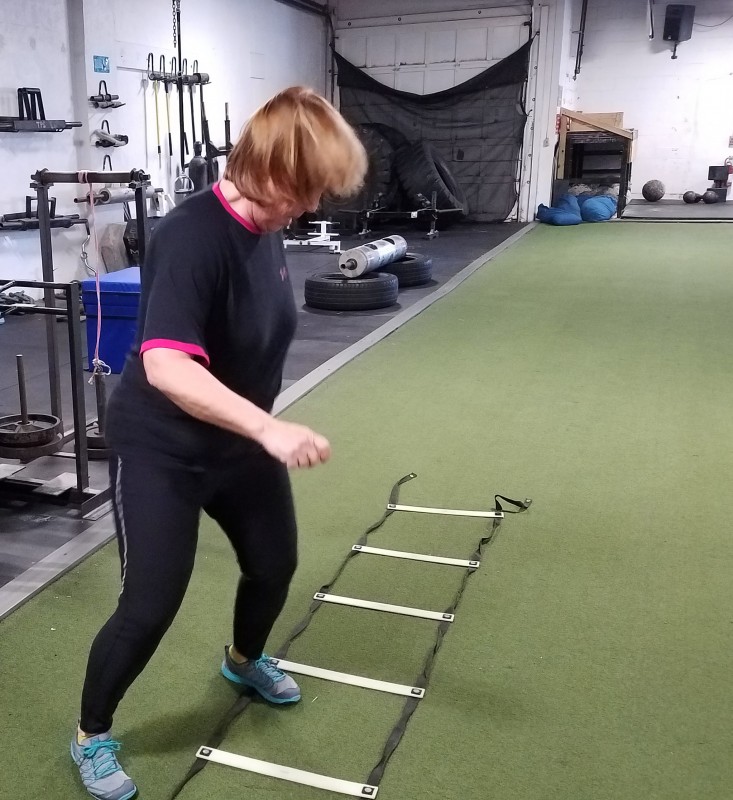 Janet, one of my older athletes using the ladder for GPP.