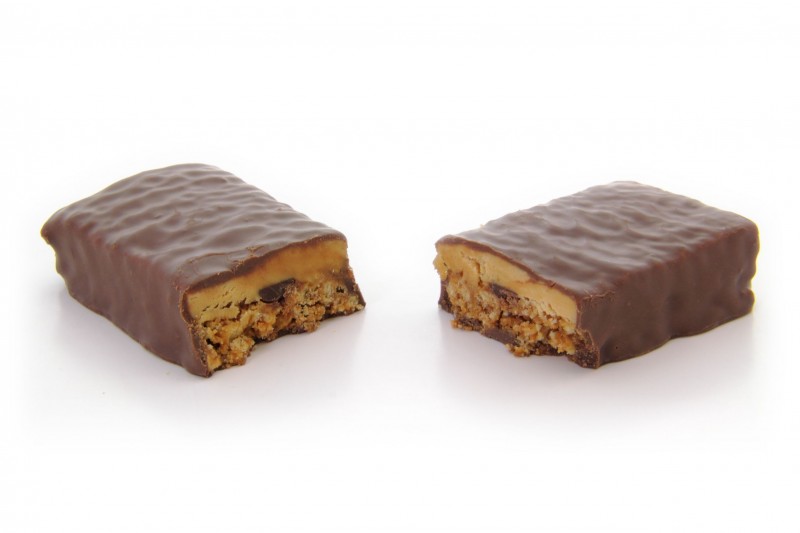 14322285 - high angle view of chocoalte protein bar cut in half.