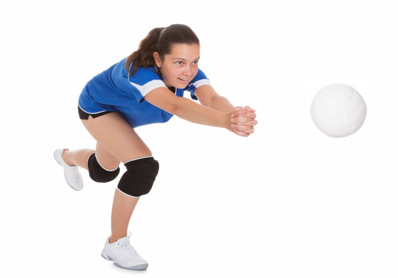 22161520 - portrait of female volleyball player isolated on white background