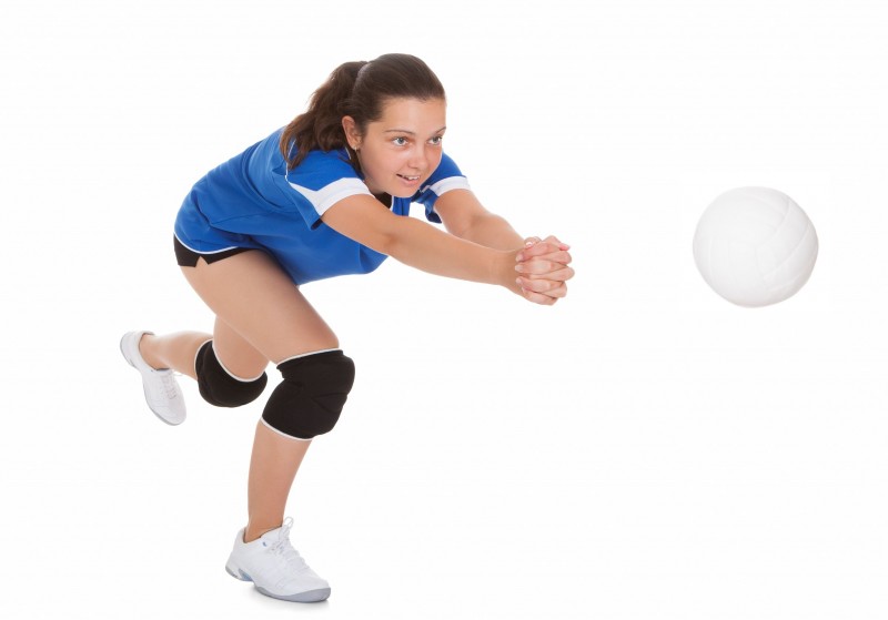 22161520 - portrait of female volleyball player isolated on white background