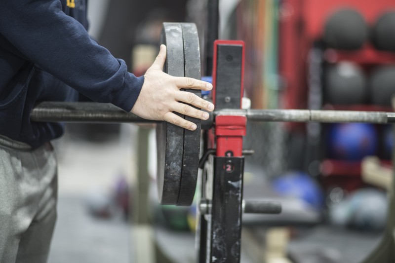 pushing plates on bar