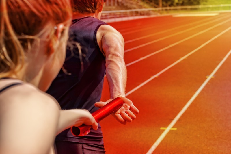 Relay race handing over female male