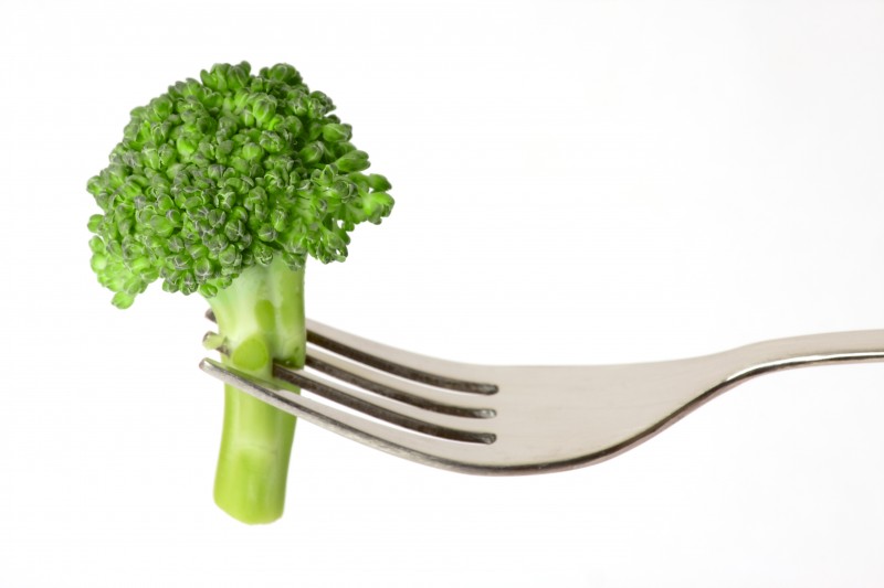 Healthy Eating Broccoli on Fork isolated on white background