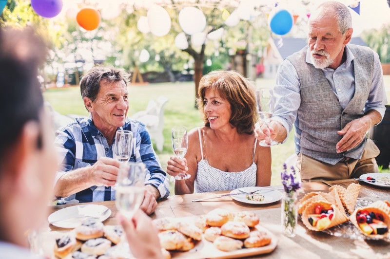 Family celebration or a garden party outside in the backyard.