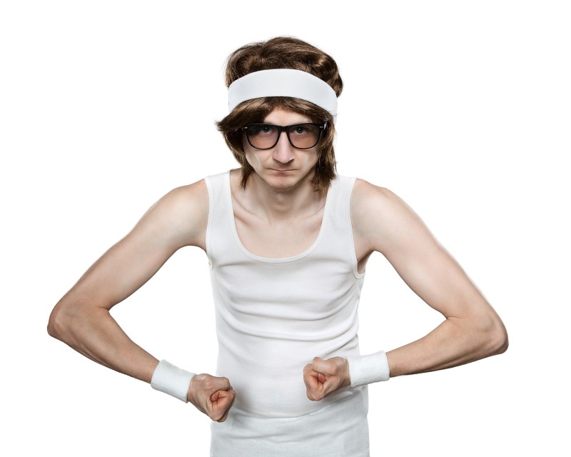 21383880 - funny retro nerd flexing his muscle isolated on white background