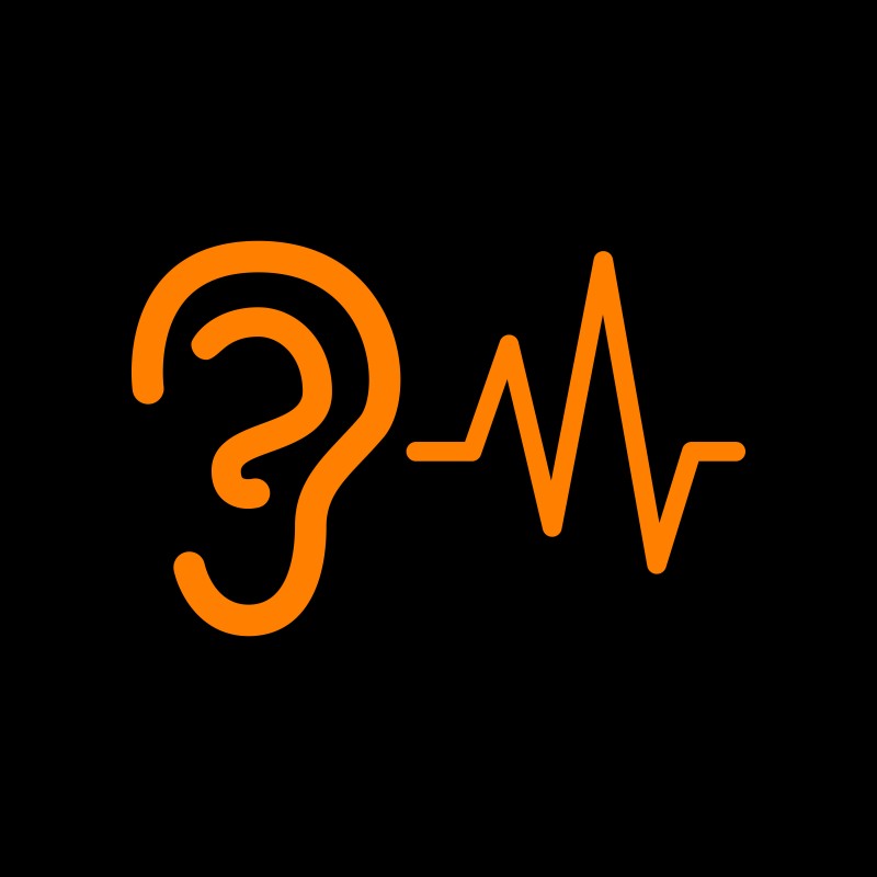 Ear hearing sound sign. Orange icon on black background. Old phosphor monitor. CRT.