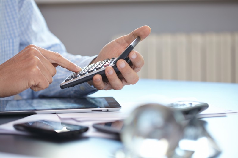 businessman with calculator