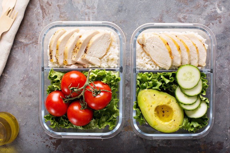 Healthy meal prep containers with chicken and rice