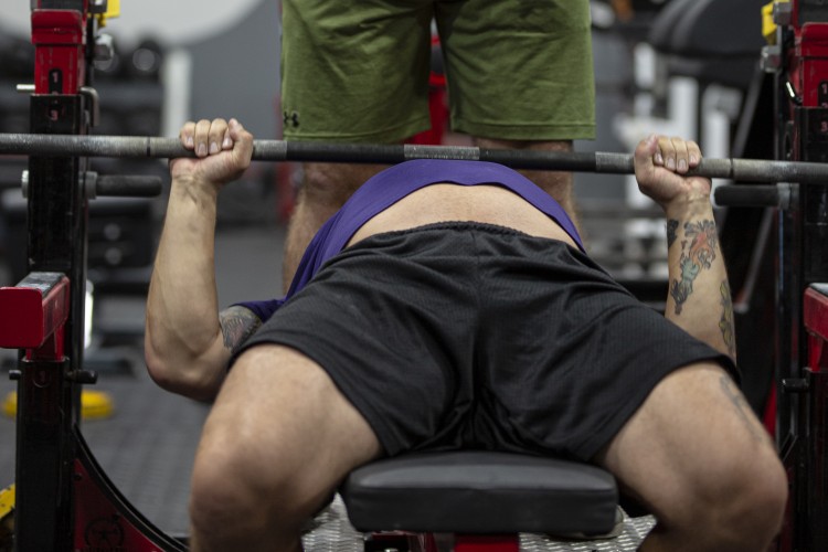 Doctors hate her for using this one tiny trick to get her bench to touch!