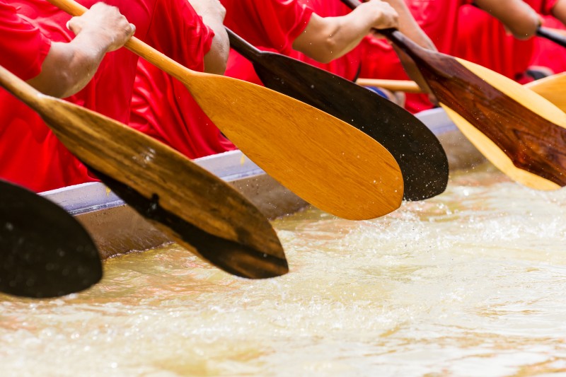 Close up of rowing team race