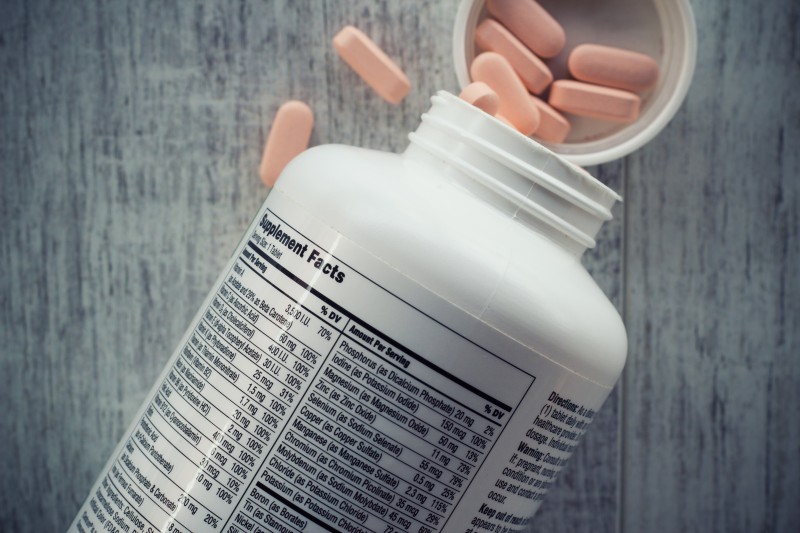 Supplement facts, Closeup of a bottle of vitamins