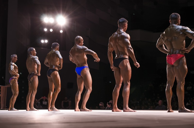 PENZA, RUSSIA - APRIL 29, 2017:Champion bodybuilders participating at the championship on stage at the open Cup of the cities of Russia on Fitness and Bodybuilding