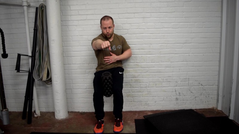 PRI-Wall-Supported-Squat-with-Right-Arm-Reach