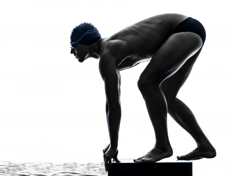 young man swimmer swimming  silhouette