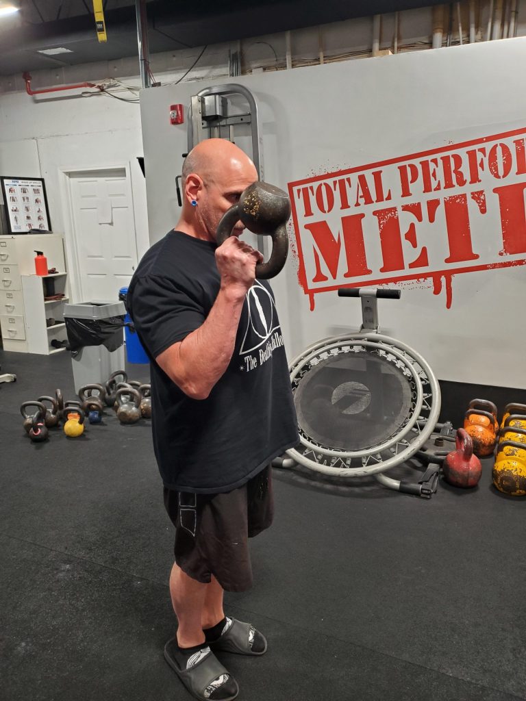 The Two Best Bicep Exercises You’re Not Doing, C.J. Murphy, Spider Curl, Kettlebell Curl, powerlifting, strongman;